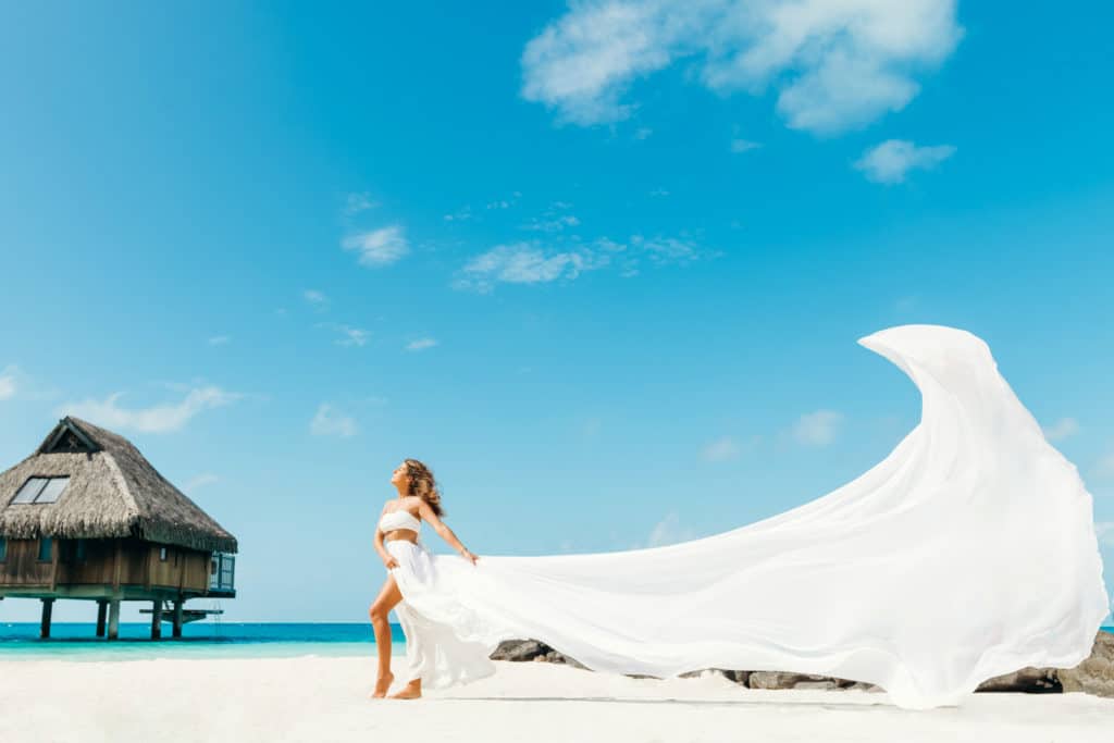 White maxi flying dress photoshoot by Bora Bora Photographer