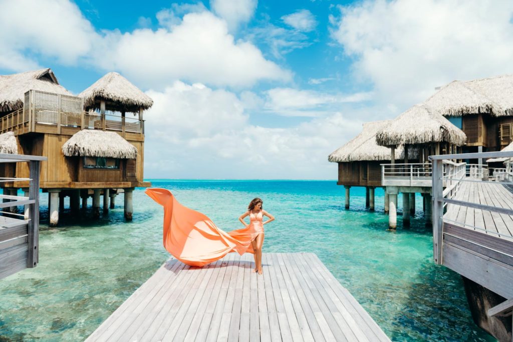 Photoshoot with flying coral dress in Bora Bora