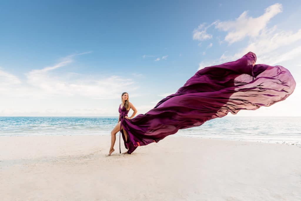 Photoshoot in Bora Bora with maxi purple flying dress