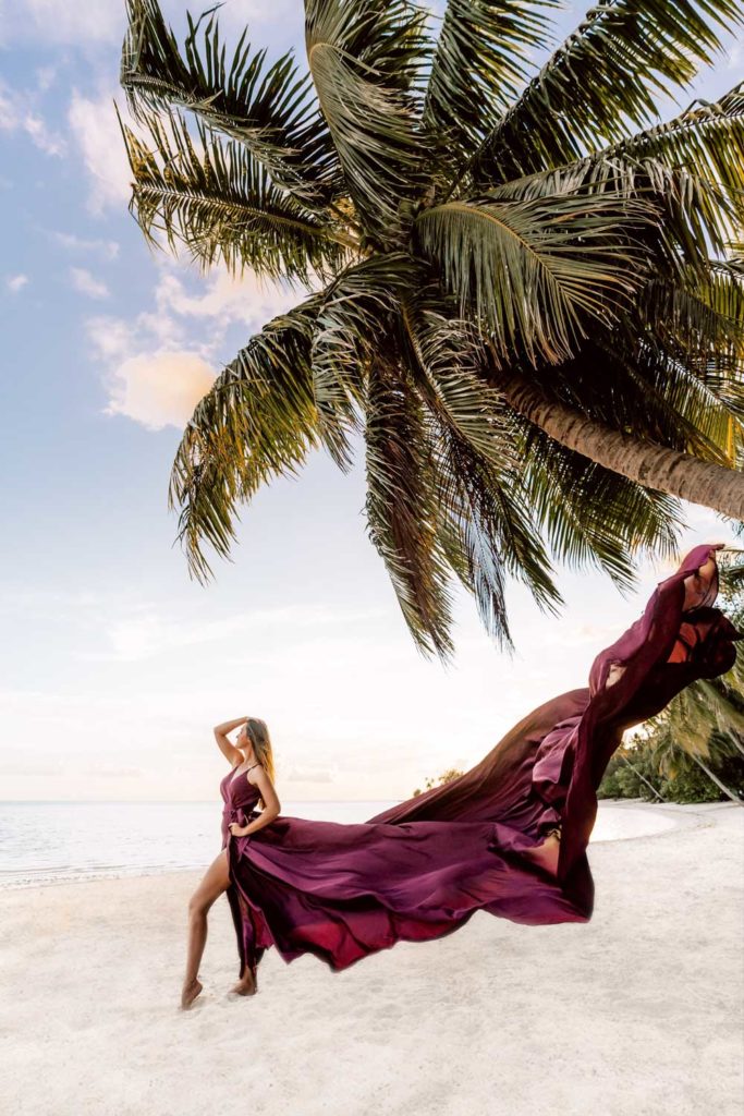 Photoshoot in Bora Bora with maxi purple flying dress