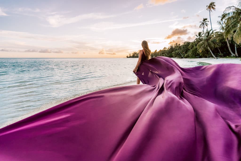 Photoshoot in Bora Bora with maxi purple flying dress