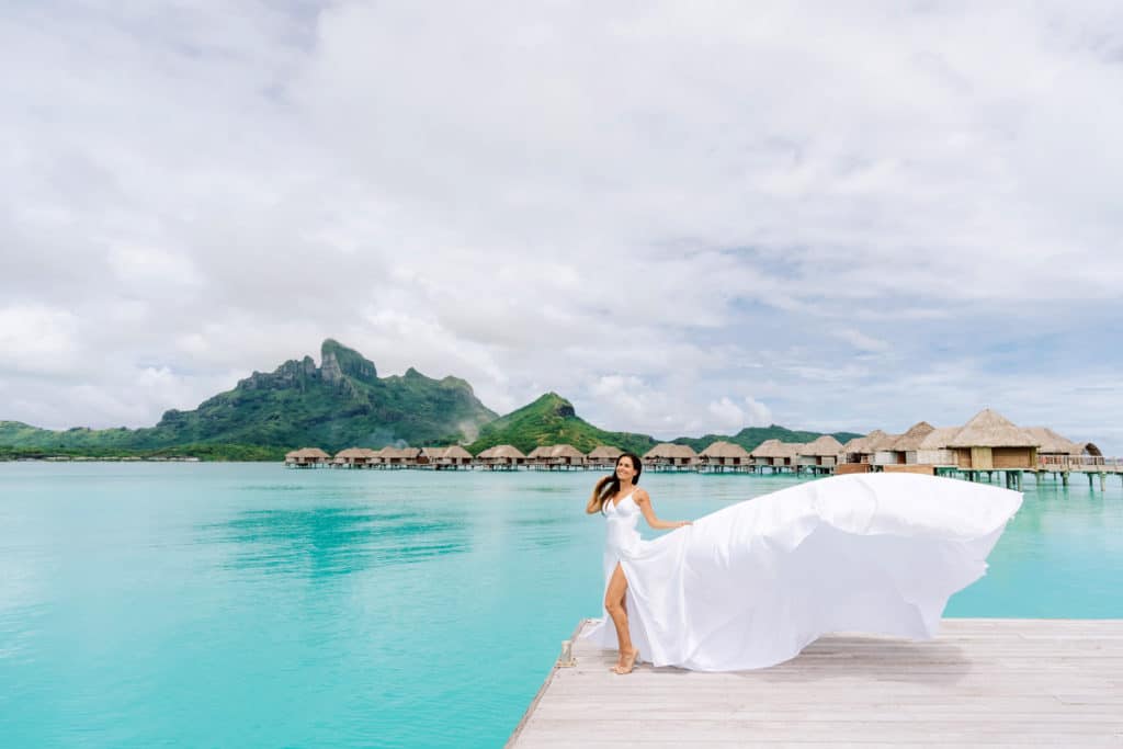 Photoshoot with flying white dress in Four Seasons Bora Bora