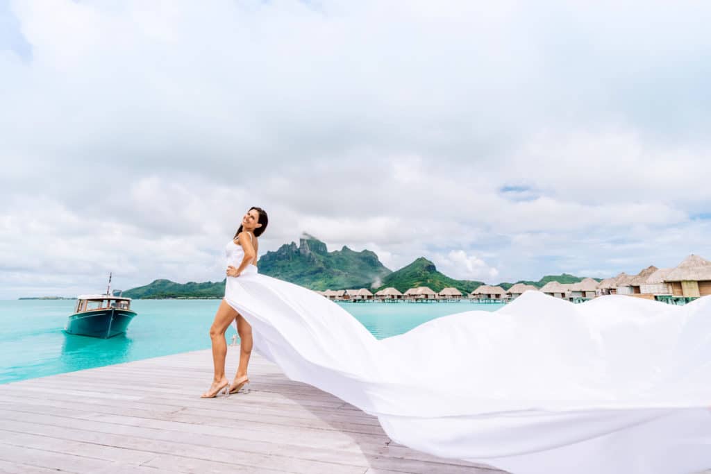 Photoshoot with flying white dress in Four Seasons Bora Bora